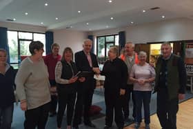 Cllr O’Connor presenting cheques to Revd Canon Jane Butler Team Rector for Church of England Kingsthorpe.