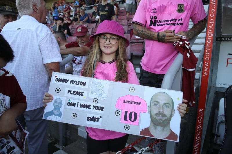 A young Northampton Town fan asks for the shirt of Danny Hylton prior to the Sky Bet League Two between Northampton Town and Hartlepool United at Sixfields on August 13, 2022.
