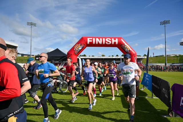 Runners heading out from the start line