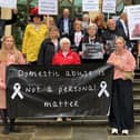 Domestic abuse campaigners marched down to the Northampton Guildhall on Thursday.