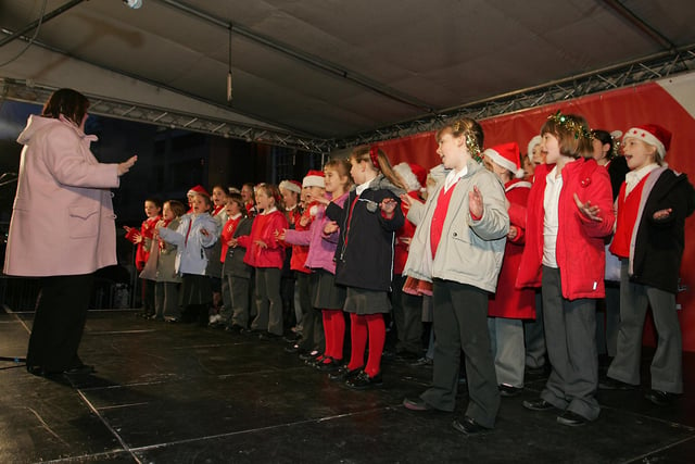 A children's choir takes to the stage in 2006.