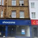 The floors above the former Shoezone could be turned into eight new flats - but no plans have been revealed to bring the retail unit back to life