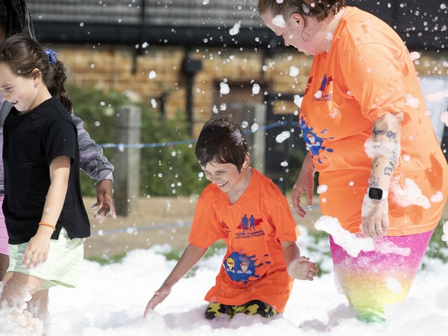 A family-friendly fun run, with water slides and obstacles, took place at Upton Country Park on Saturday (August 12) to raise funds for a Northampton charity.