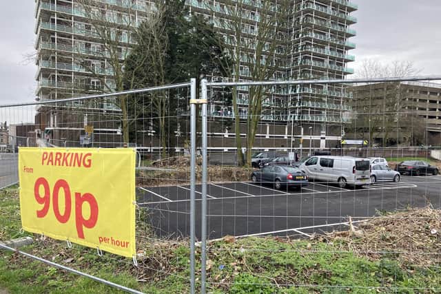 The car park has advertised its opening and low prices on bright yellow banners surrounding the site.Credit: Nadia Lincoln