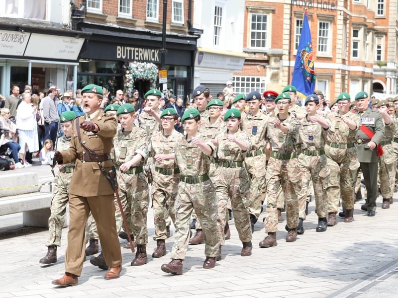 Kettering town centre: crowds line town centre to welcome The Royal Anglian Regiment for Armed Forces Day parade /National World