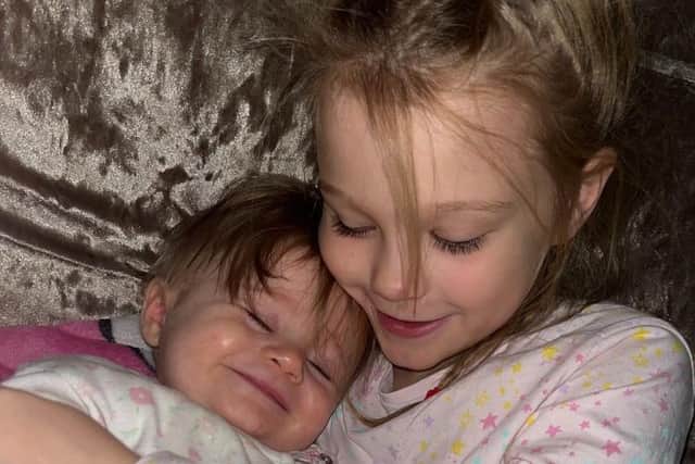Araya and her nine-year-old sister Isla ahead of the heartbreaking incident on February 21.