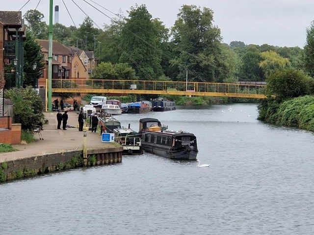 Pictures from day four of a murder probe by the River Nene near Beckets Park, where a man was found dead on a bench early Friday morning (August 1). Northamptonshire Police divers were searching the water on Monday morning (August 4) and are appealing for witnesses.