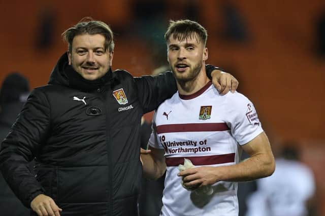 Sam Sherring with goalkeeping coach James Alger