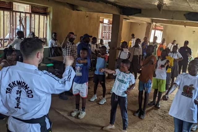Master Tom Nicholson delivering martial arts education to the students in Congo