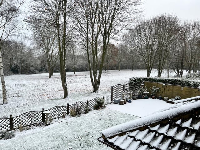 A back garden and fields close to East Hunsbury.