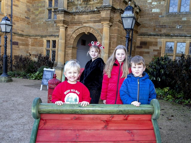 Children meet Father Christmas at Delapre Abbey in December 2022.
