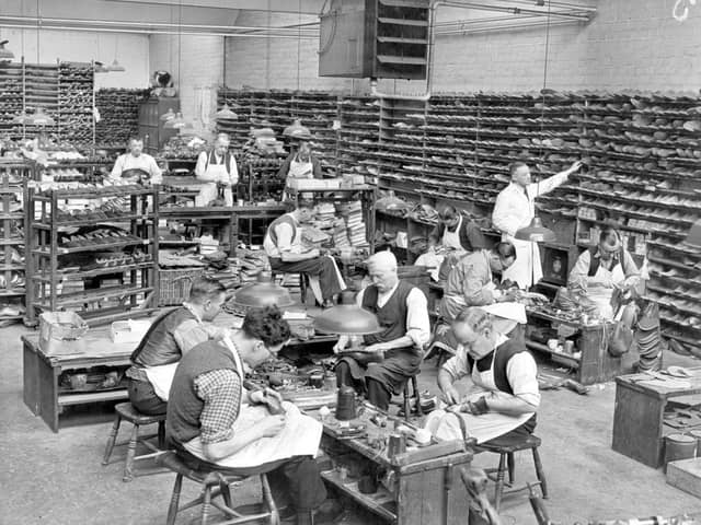 Shoemakers at work in the hand-sewing room helping with post-war trade at Sticklands, Northampton around 1950.