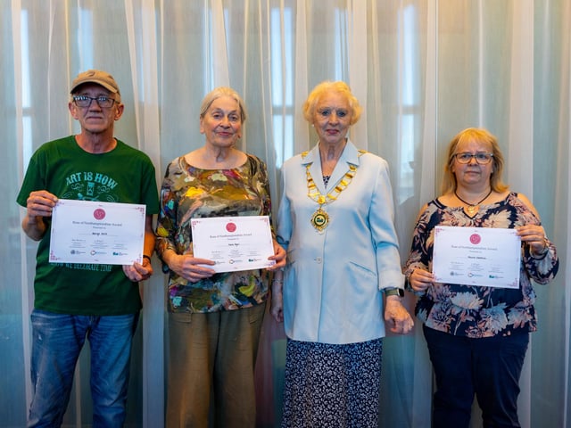 Councillor Barbara Jenney from North Northants Council presenting George Hill and Kate Dyer from the KHL Community Workshop, and Nicola Stanton from Jorgie's Buddies, with their Rose of Northamptonshire Awards.
• George Hill supports countless community activities in Corby, Kingswood and Hazel Leys, volunteering for the KHL Big Local Community Trust and dedicating his time to organise events such as the annual Field Day Festival.
• Kate Dyer volunteers for the Friends of Kingswood and the Corby Kingswood and Hazel Leys Community Workshop, welcoming the local community to join a range of creative projects
• Nicola Stanton founded a Be Brave Bears project, providing the bears to children with life limiting, life threatening or lifechanging conditions. Over 1,000 bears have been sponsored in Northamptonshire.
