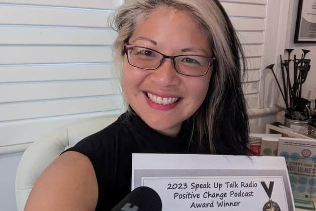 NLive's Dr Audrey Tang with Positive Change Podcast Awards Certificate