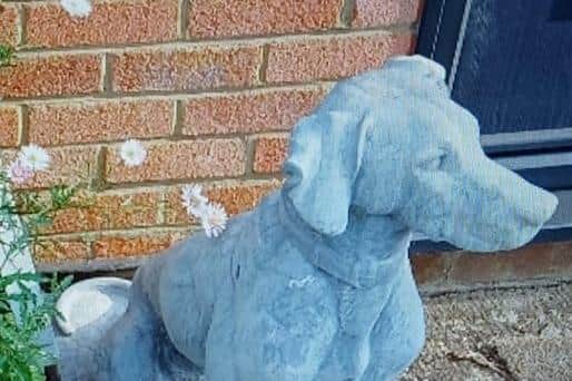 The cast stone statue of a hunting dog has now been returned to its rightful owner.