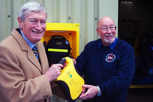 Defibrillator presentation with Richard Allen from RALPHH (left) and Middle Nene Sailing Club commodore Tony Wright.