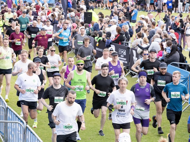 Hundreds of runners braved showers and wind to take on the race on Sunday (May 25), which started and finished at Sixfields stadium.