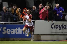Louis Appere runs away to celebrate scoring the Cobblers' winning goal in their 2-1 victory over Carlisle United on Tuesday (Picture: Pete Norton)