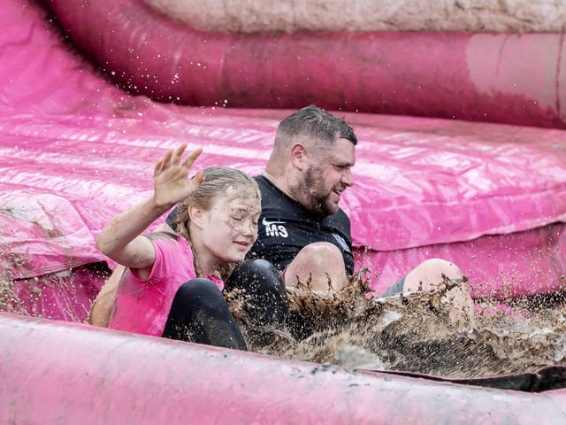 All smiles as participants tackled obstacles during Race for Life's Pretty Muddy on Saturday July 13, 2024 in Abington Park.