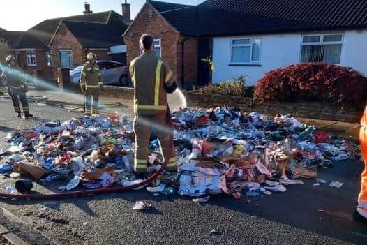 A bin lorry caught fire and had to eject its load in Collingdale Road.