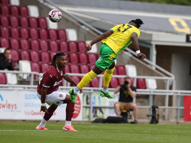 Jonathan Rowe heads in Norwich's first goal.