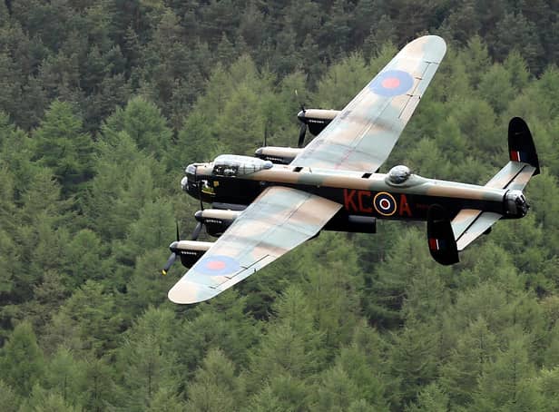 A Lancaster bomber flies over Ladybower reservoir in the Derbyshire Peak District to mark the 70th anniversary of the World War II Dambusters mission on in Derwent, England. Ladybower and Derwent reservoirs were used by the RAF's 617 Squadron in 1943 to test Sir Barnes Wallis' bouncing bomb before their mission to destroy dams in Germany's Ruhr Valley. This was taken to marks the 70th anniversary of the famous Dambuster mission and will be watched by veterans from the original campaign.  (Photo by Christopher Furlong/Getty Images)