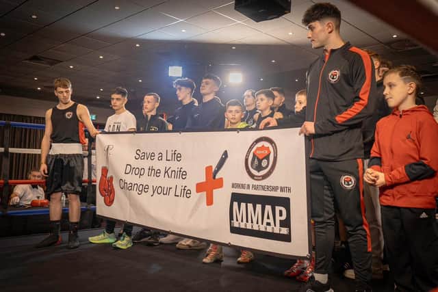 The banner is unfurled at the Northampton showcase/ Rushden and Higham Community Boxing