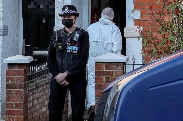 Forensic officers at the property in Kingsley