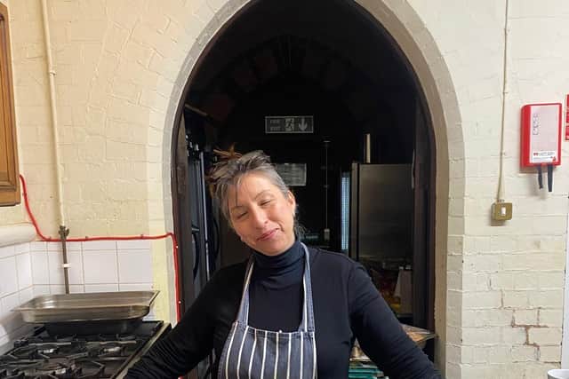 Choir volunteer helps to prepare delicious hot meals at the end of every rehearsal