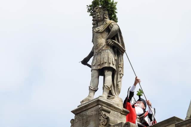 The Mayor placing an oak wreath on the statue of Charles II
