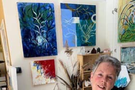 Artist Annette Sykes with her work