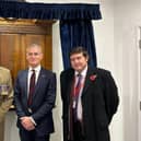 Major General Tim Hyams, Travis Perkins' CEO Nick Roberts, and Andrew Lewer MP.