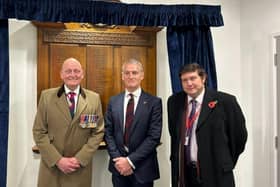 Major General Tim Hyams, Travis Perkins' CEO Nick Roberts, and Andrew Lewer MP.