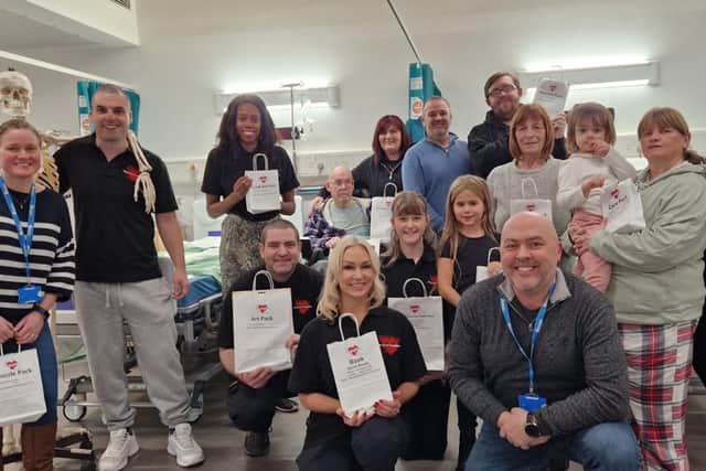 Volunteers during the filming of The Lewis Foundation's charity single music video