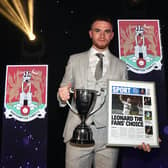 Marc Leonard with his awards