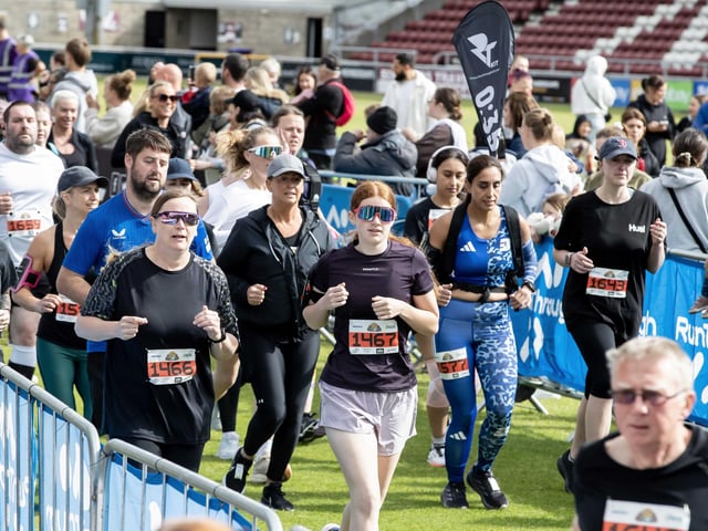 Hundreds of runners braved showers and wind to take on the race on Sunday (May 25), which started and finished at Sixfields stadium.