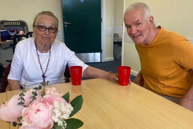 Affinity friends using the new dementia friendly cups and chairs