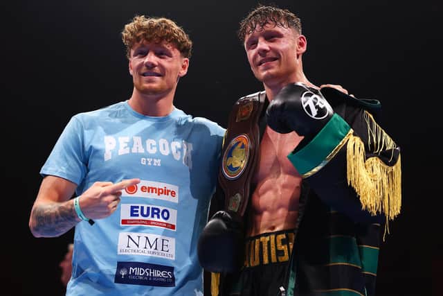Carl Fail (right) celebrates his title win in Bournemouth with twin brother Ben