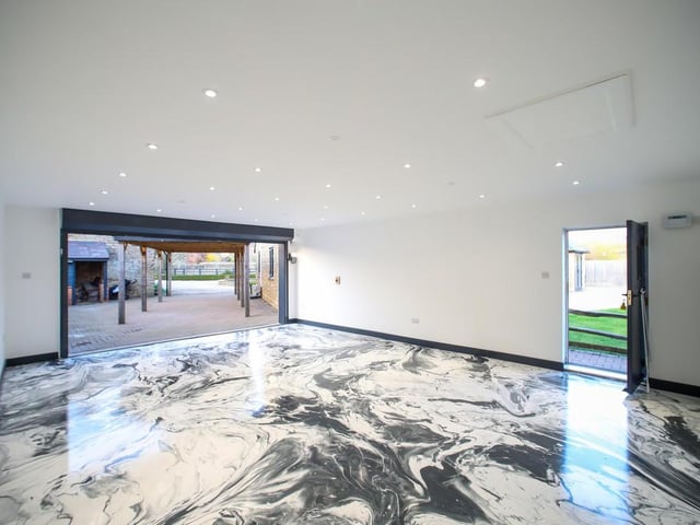 This barn conversion with traditional features and a lot of land could be yours for £1.75 million.