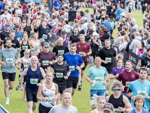 Hundreds of runners braved showers and wind to take on the race on Sunday (May 25), which started and finished at Sixfields stadium.