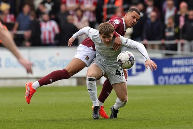 Shaun McWilliams battles for the ball in the defeat to Exeter City on April 20, his final appearance for the club at Sixfields (Photo by Pete Norton/Getty Images)