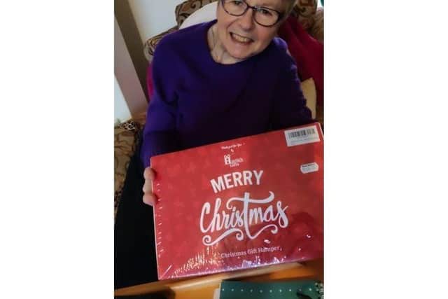 The team gifted the hamper to Bernadette Casson