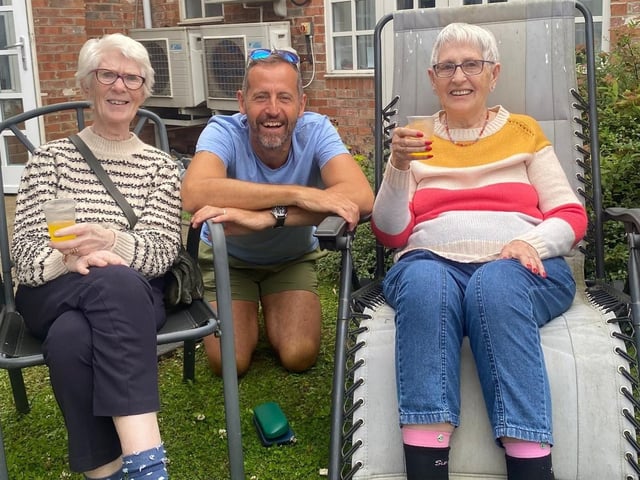 Residents Pat and Pauline with Martin enjoying all the fun of the dog show