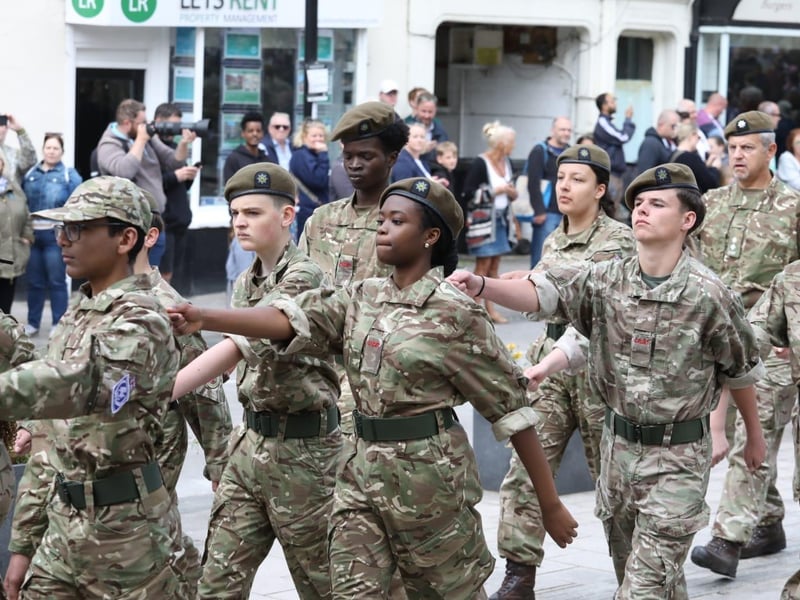 Kettering town centre: crowds line town centre to welcome The Royal Anglian Regiment for Armed Forces Day parade /National World