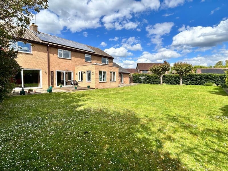 An enormous back garden provides huge space for entertaining and recreation