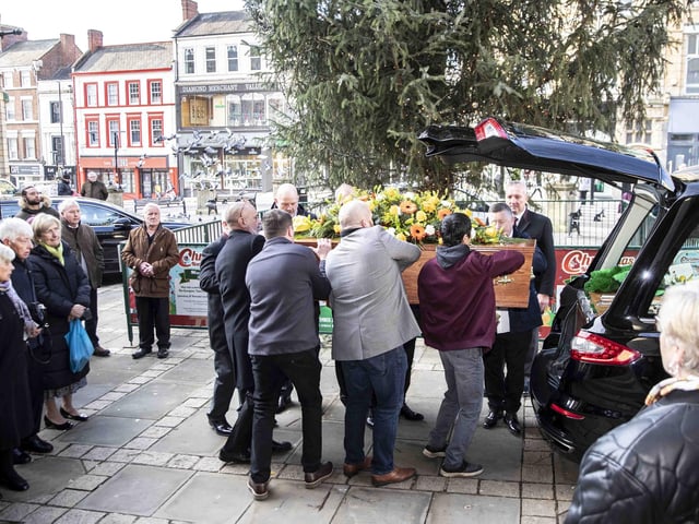 Hundreds gathered in the Market Square on Wednesday morning (December 7) to pay their respects to town legend Eamonn 'Fitzy' Fitzpatrick