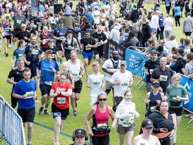 Hundreds of runners braved showers and wind to take on the race on Sunday (May 25), which started and finished at Sixfields stadium.