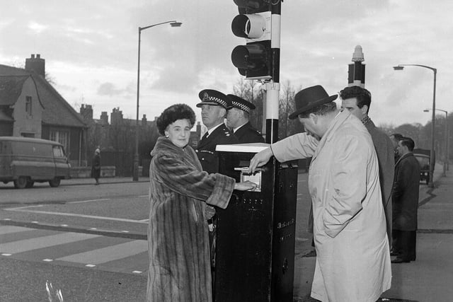 New traffic lights at Corstorphine Road are switched on by Councillor Robertson Murray in February 1964.