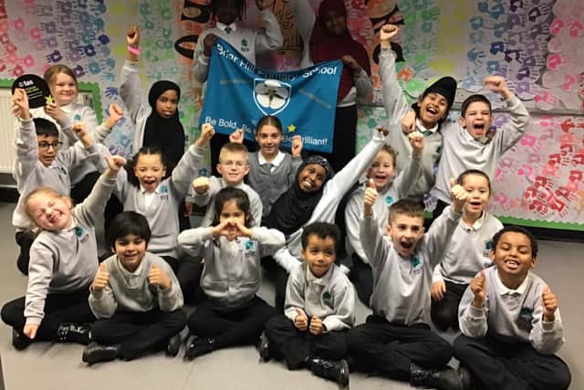 Briar Hill Primary School pupils celebrate their jump from a 'good' to 'outstanding' Ofsted grade.