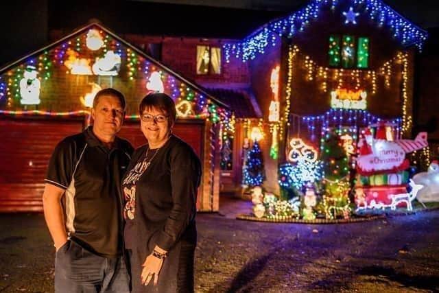 Nick and Mel Phipps pictured outside their home in 2022